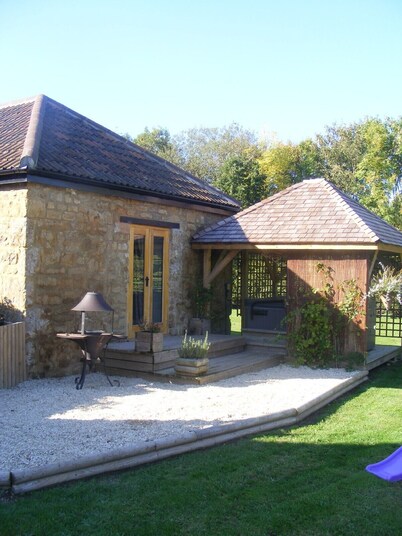 Contemporary, modern barn conversion with private hot tub