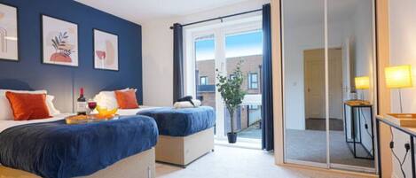 1 bedroom, desk, iron/ironing board, travel cot