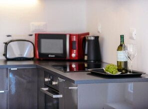 Apartment (2 Bedroom Apt with Balcony n Sea View) | Private kitchen | Fridge, high chair - Apartments Villa Capitano (Zupa dubrovacka)