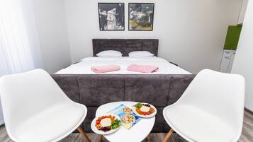 Iron/ironing board, free cribs/infant beds, bed sheets