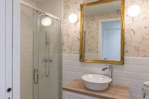 Shower, towels, toilet paper