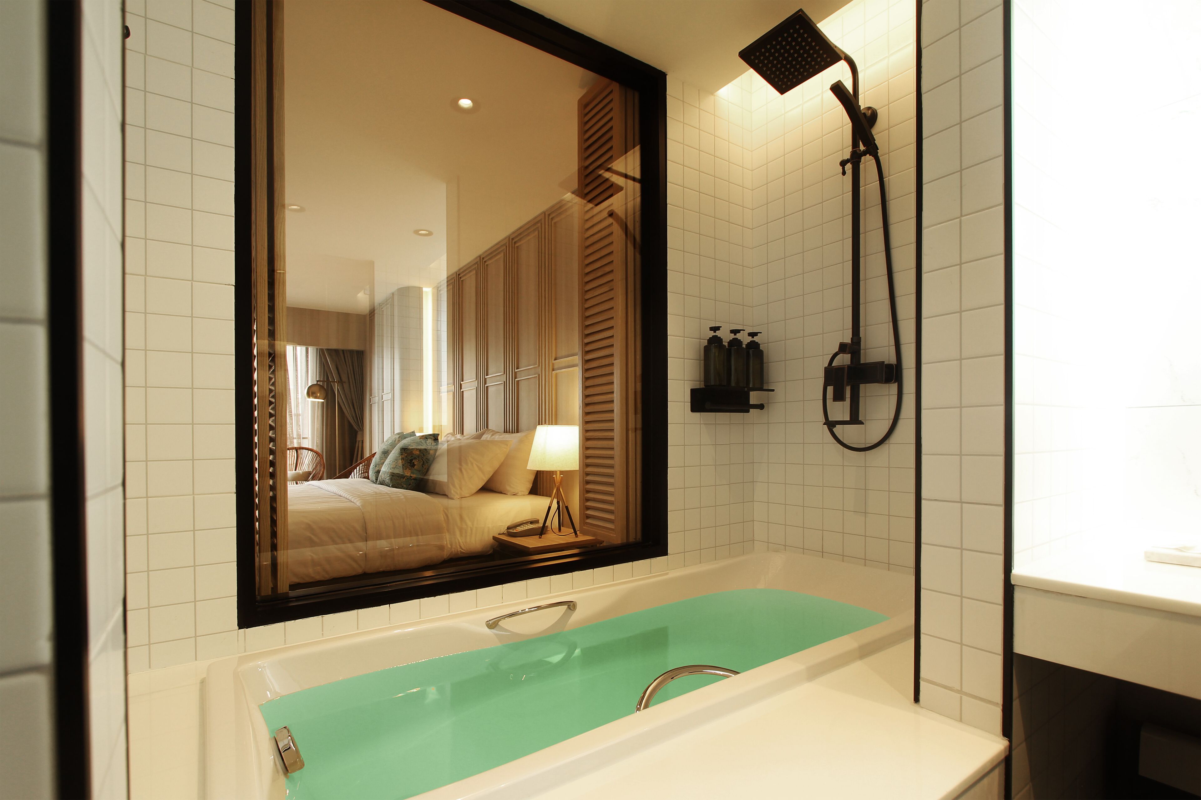 nares executive twin room | bathroom | separate bathtub and shower, hydromassage showerhead, hair dryer