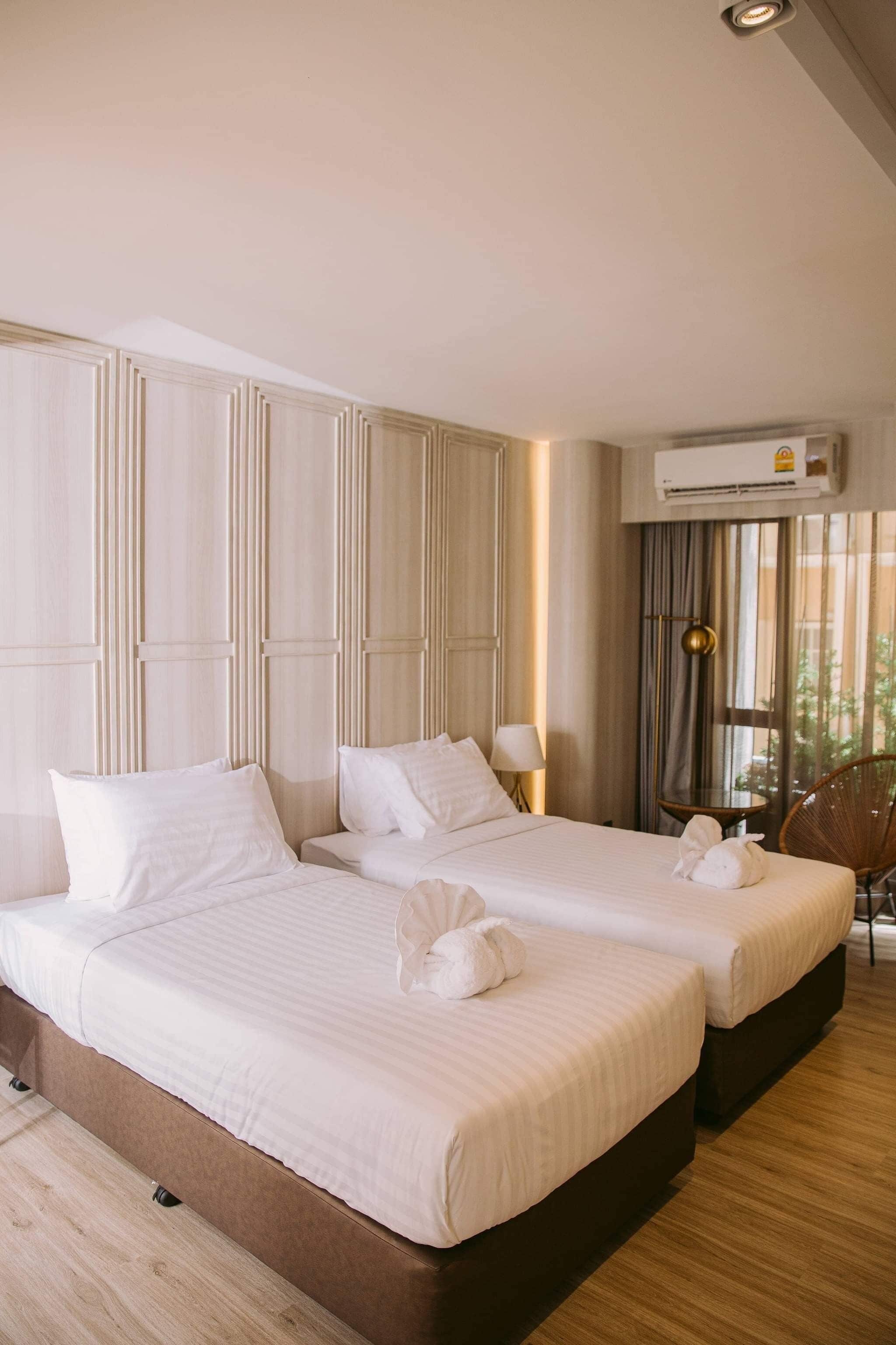 nares deluxe twin room | in-room safe, blackout curtains, free wifi, bed sheets