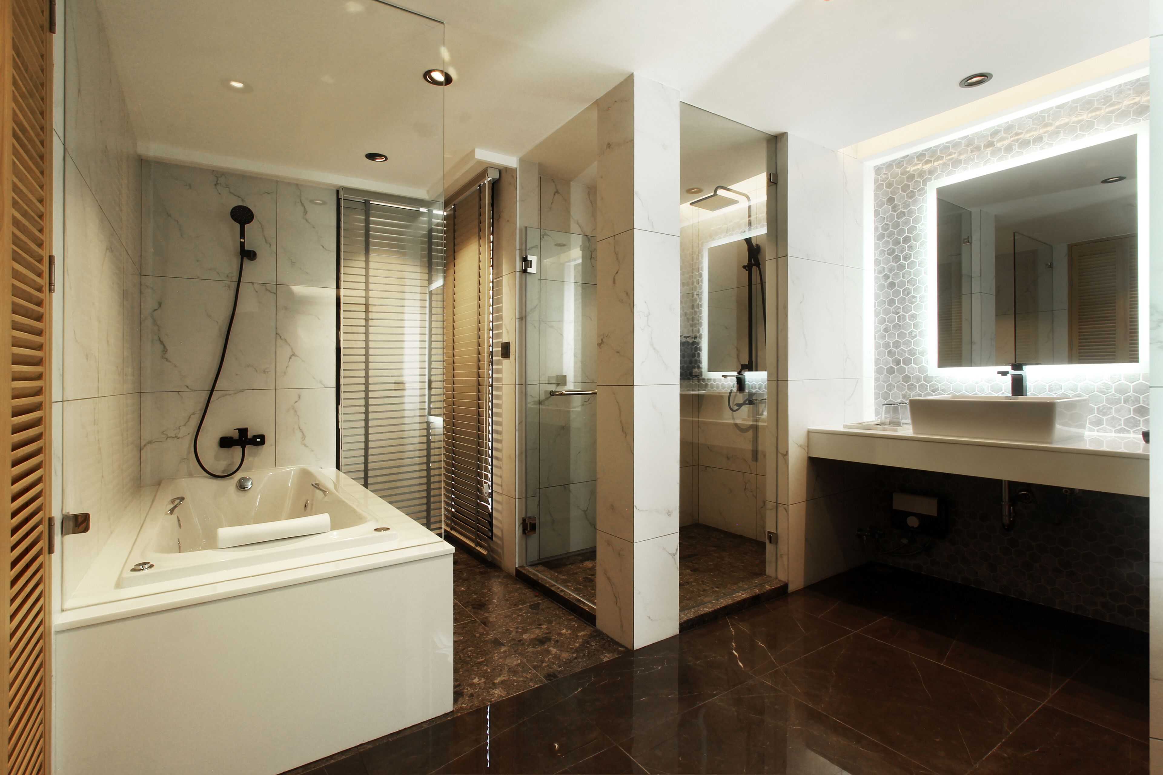 nares suite room | bathroom | separate bathtub and shower, hydromassage showerhead, hair dryer