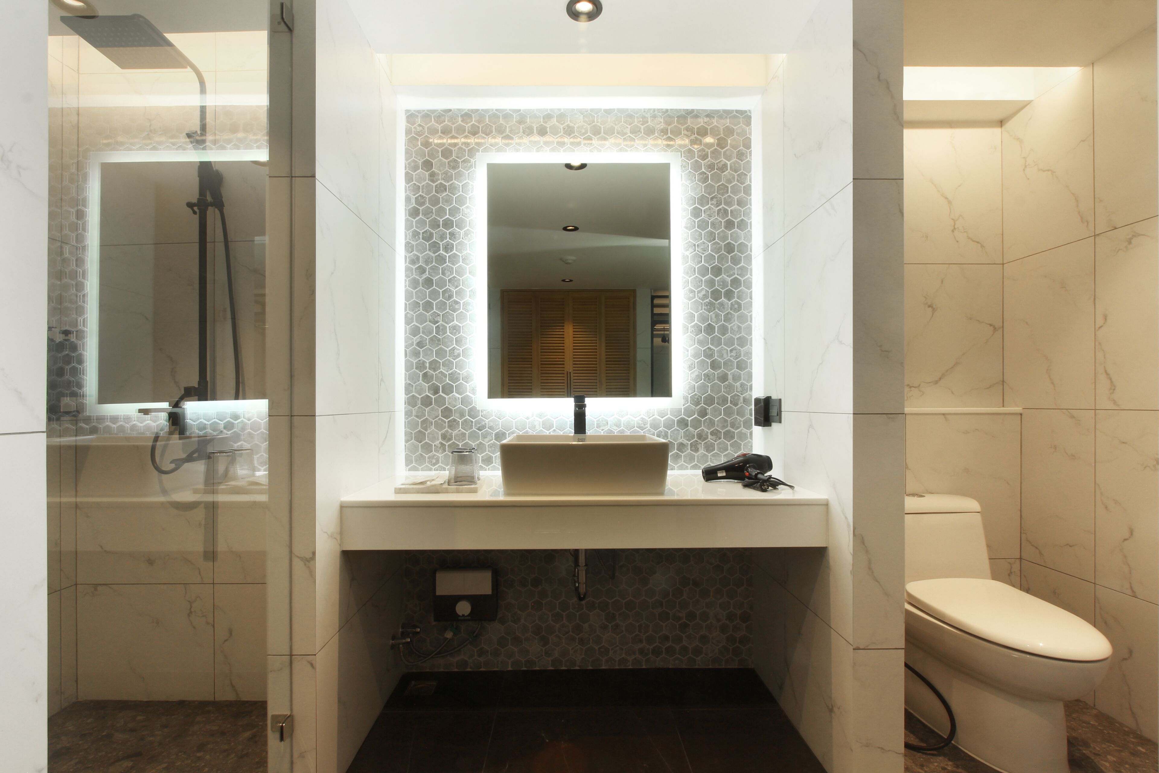 nares suite room | bathroom | separate bathtub and shower, hydromassage showerhead, hair dryer