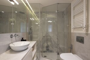 Signature Apartment | Bathroom | Shower, rainfall showerhead, designer toiletries, hair dryer