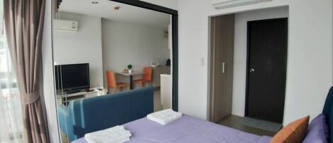 Suíte, 1 quarto | 1 quarto, escrivaninha, ferros/tábuas de passar roupa, Wi-Fi de cortesia