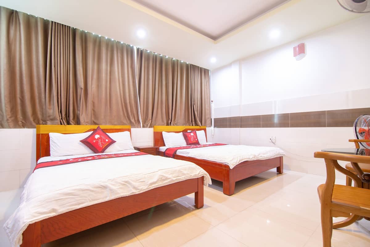 Habitación familiar | Escritorio, wifi gratis y ropa de cama