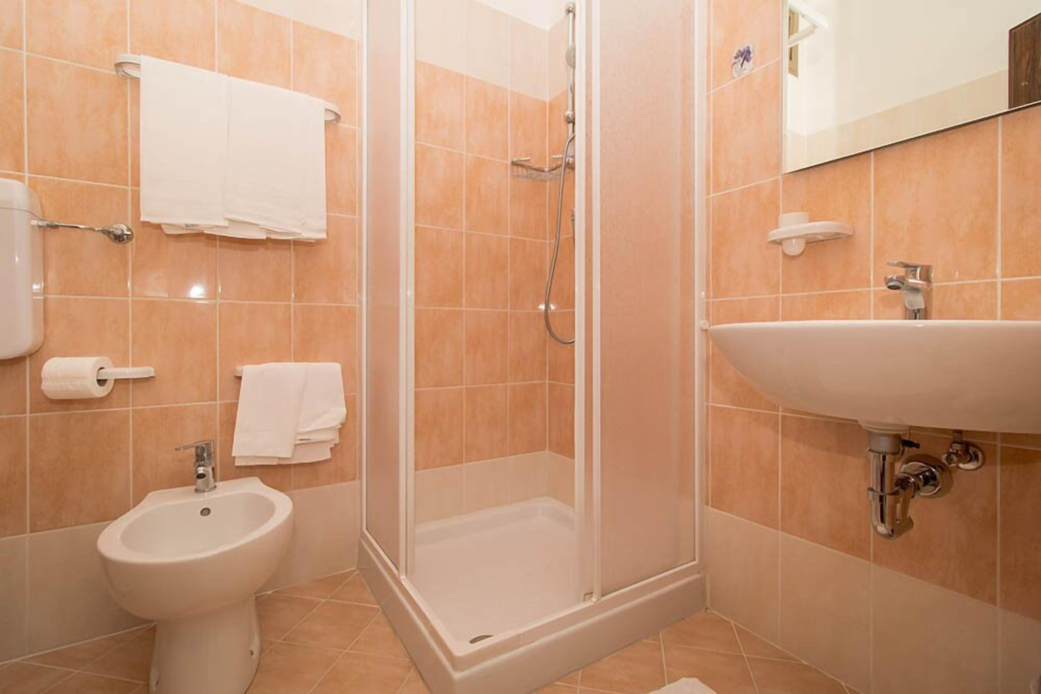 shower, bathrobes, bidet, towels