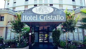 The entrance to Hotel Cristallo with a sign indicating free WiFi, indoor cinema, and videoshow. - Hotel Cristallo (Riolo Terme)
