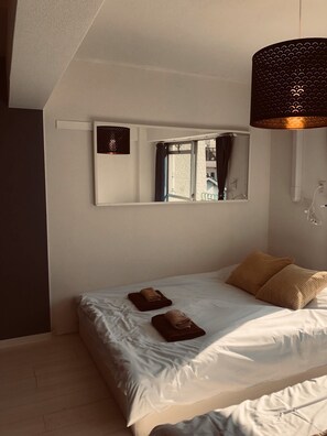 Departamento | 1 habitación, tabla de planchar con plancha, wifi gratis y ropa de cama 