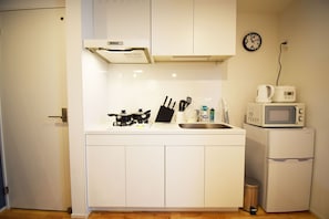 Apartment | Private kitchenette | Fridge, microwave, stovetop, electric kettle