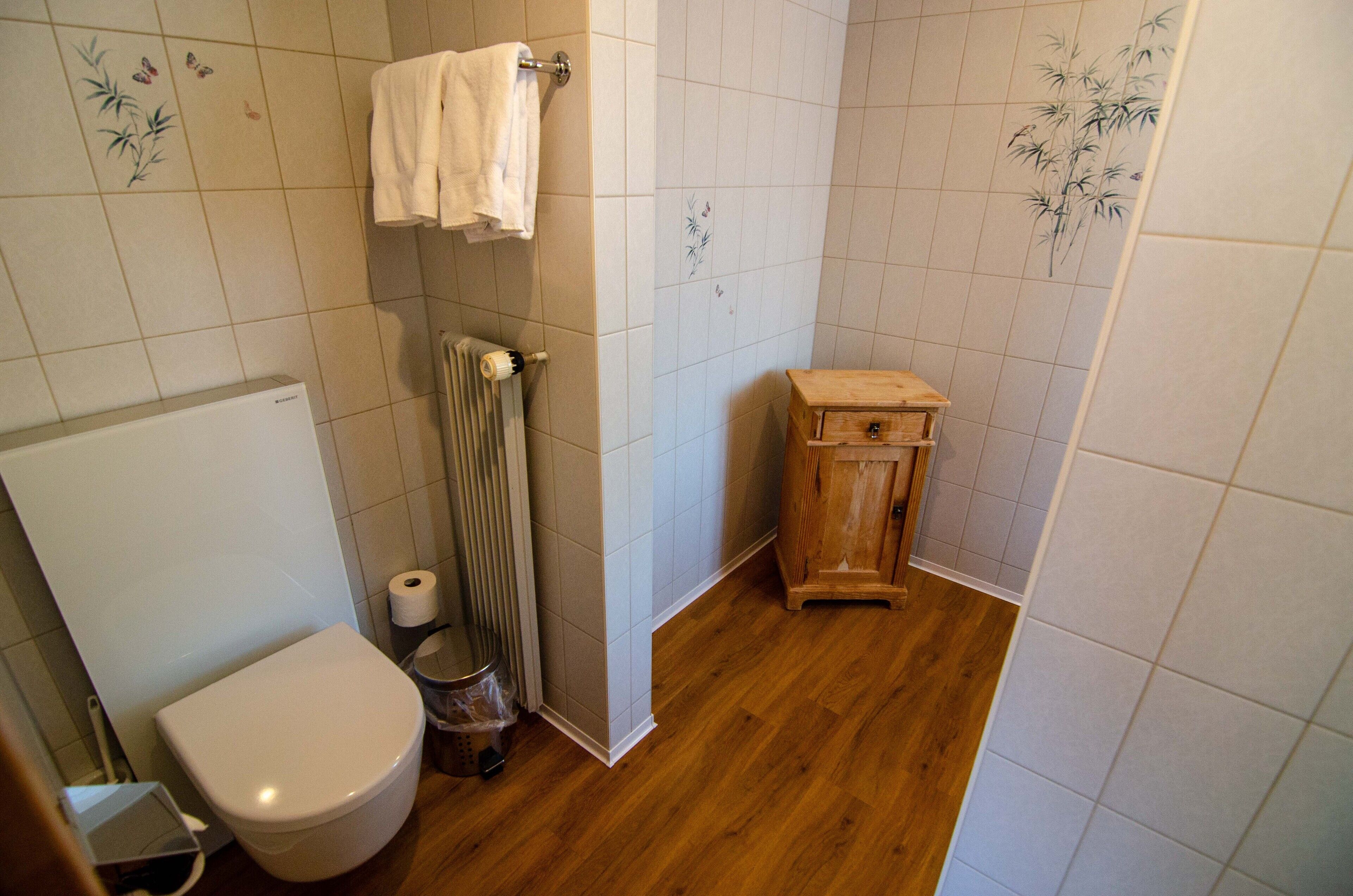 superior double room | bathroom | hair dryer, towels, soap, shampoo