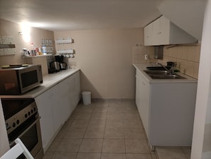 Mini-fridge, microwave, oven, stovetop