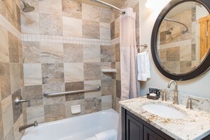 A bathroom with a bathtub, a shower with a glass door, a vanity with a sink, and a mirror. - Pine Ridge Incline Condo: Ski-In, Walk To Downtown (Breckenridge)