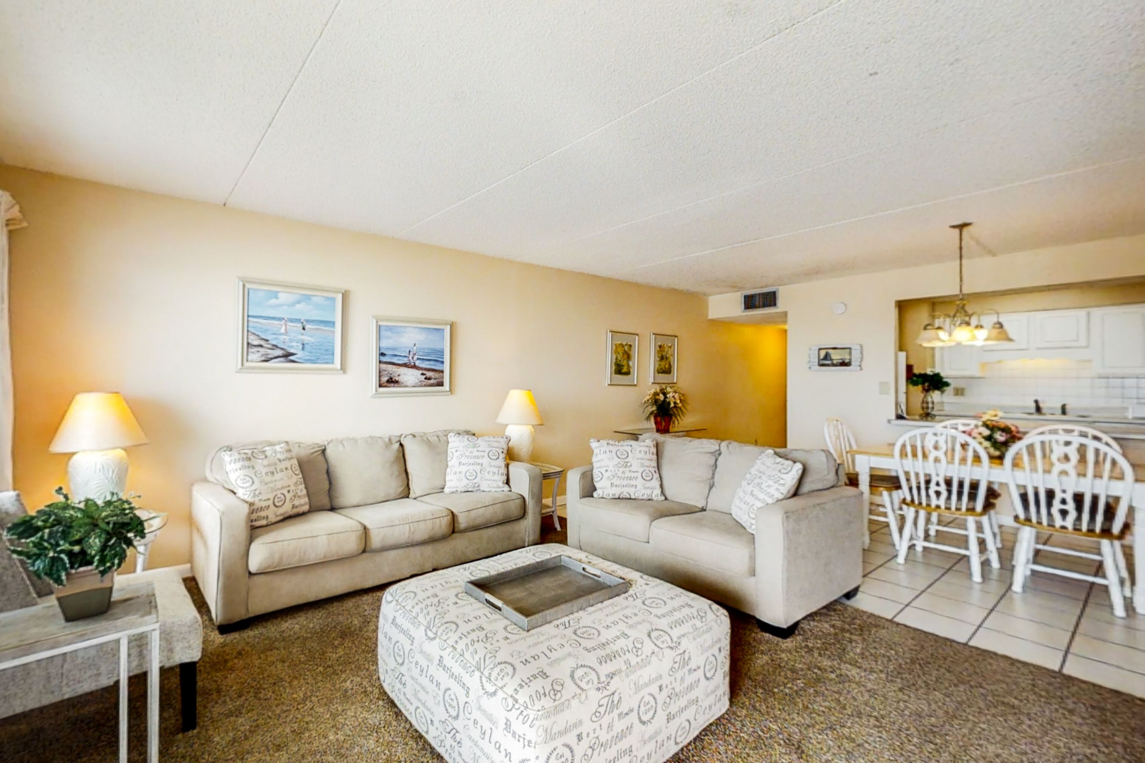 Updated beachfront condo with beach setup - quick drive to entertainment