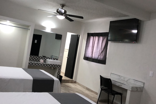 Basic Quadruple Room | Desk, free WiFi, bed sheets