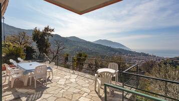 Enjoy a romantic meal on this terrace with a stunning city and mountain view.