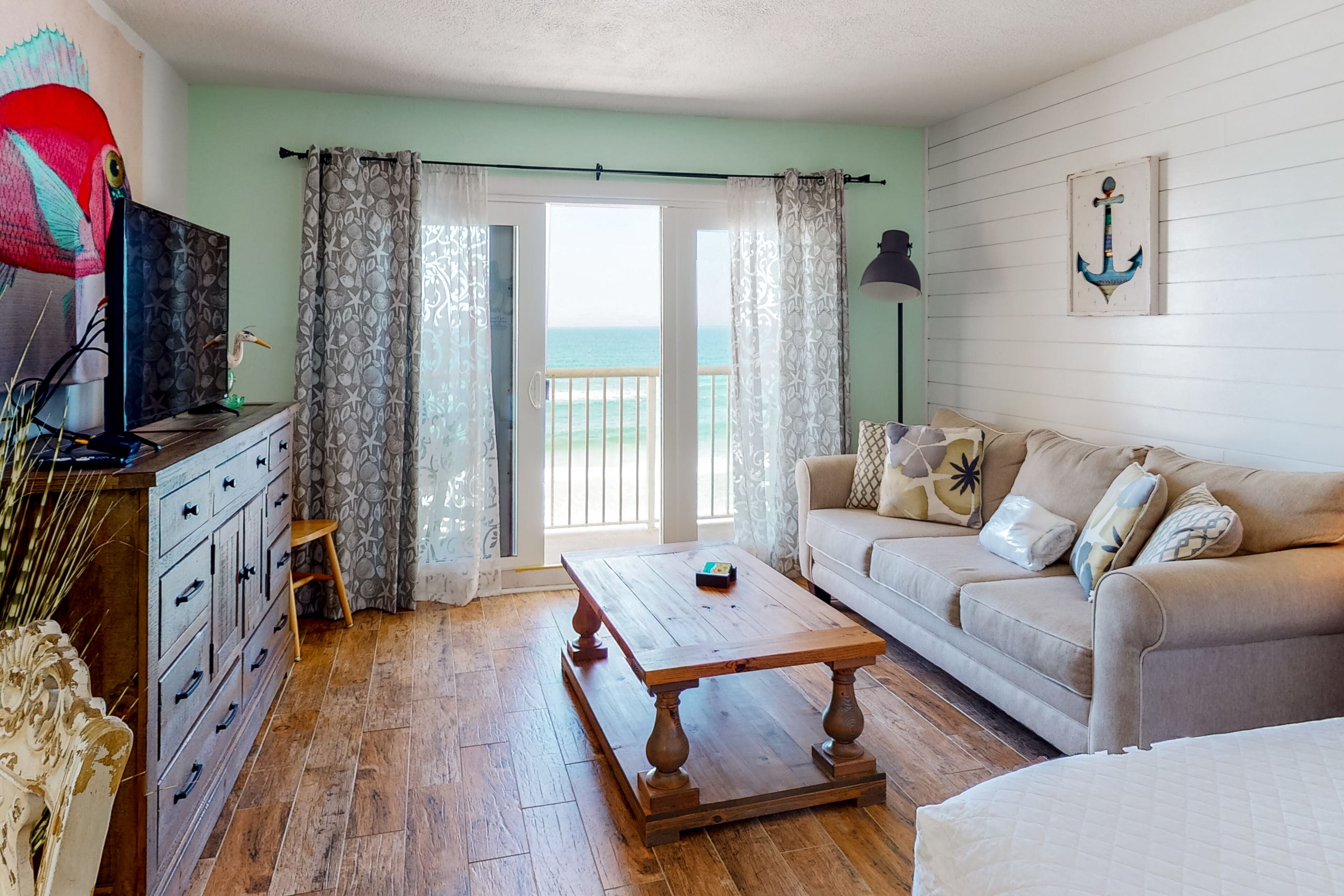 Modern oceanfront studio w/ pool access, central AC, and beach service