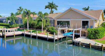 ~ Spacious Waterfront 4 Bedroom with Large Heated SW facing pool ~