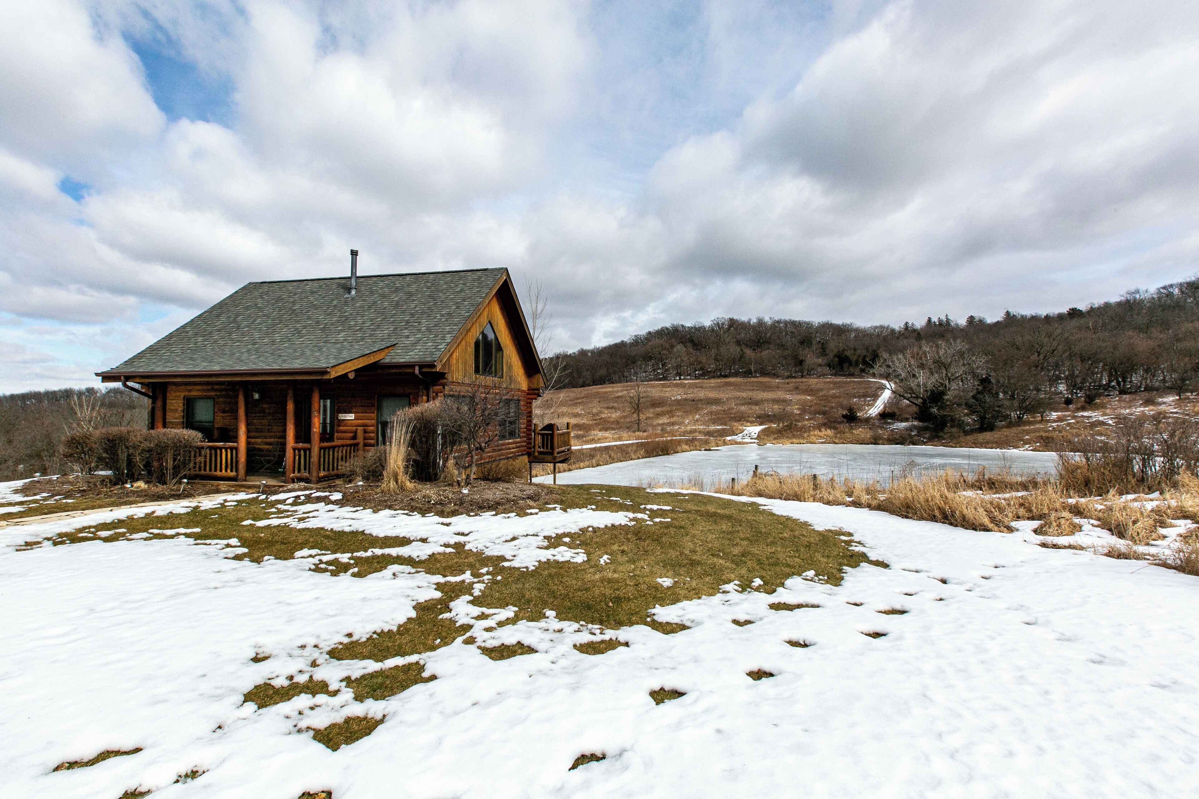 Cozy Log Cabin with Hot Tub & Only 5 Miles from Downtown!
