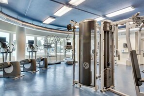 Work out in style with our fully equipped gym featuring treadmills, a stationary bike, and weight machines.