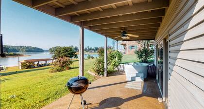 Lakefront home with free attraction tickets, deck, hot tub, and pool table