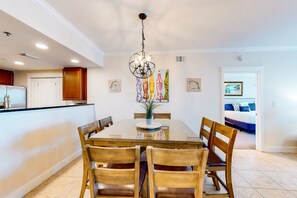 Enjoy a bright and welcoming dining experience in this stylish space with a large table and comfortable seating.