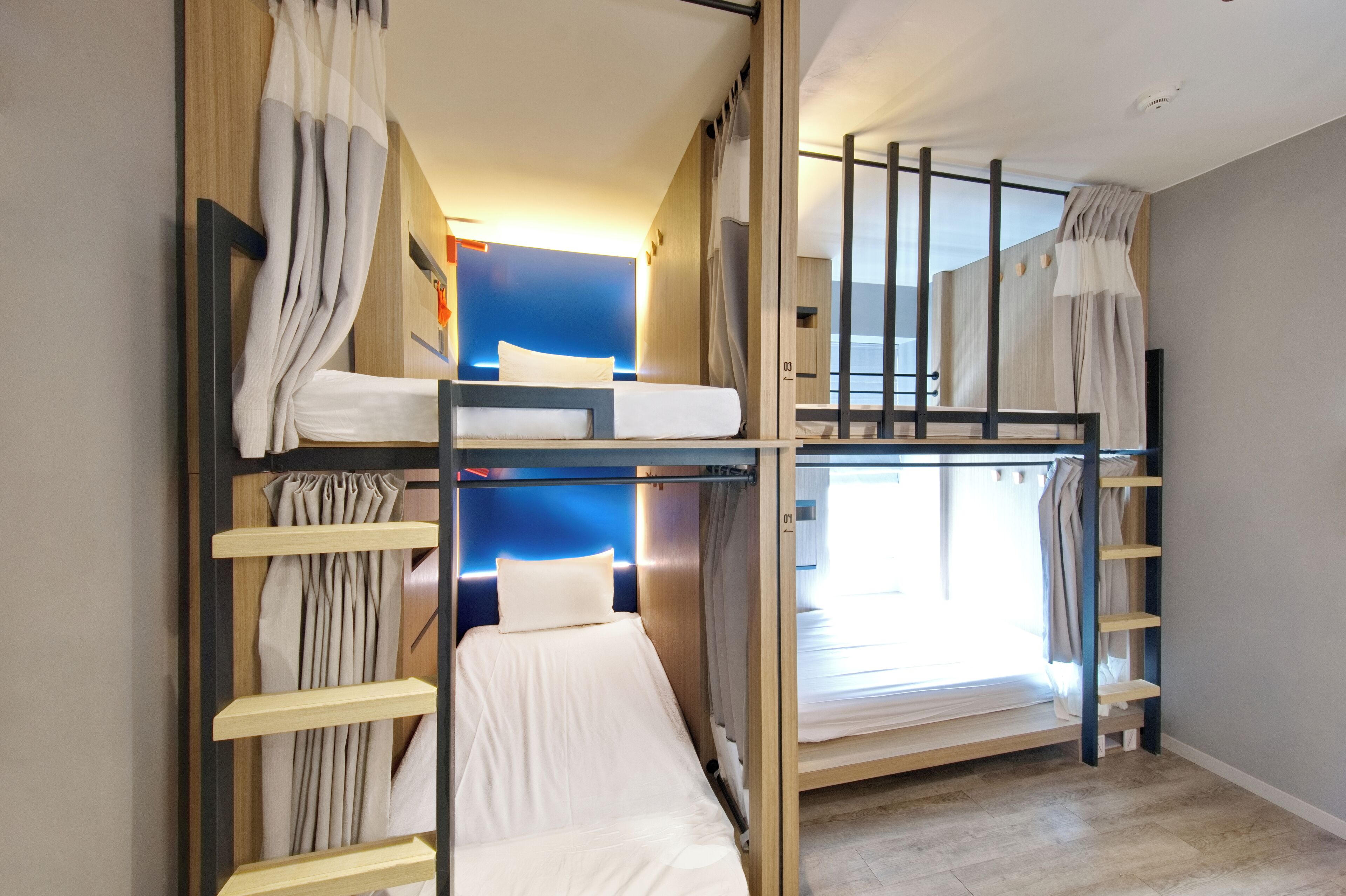 basic shared dormitory, multiple beds | premium bedding, down duvets, soundproofing, iron/ironing board