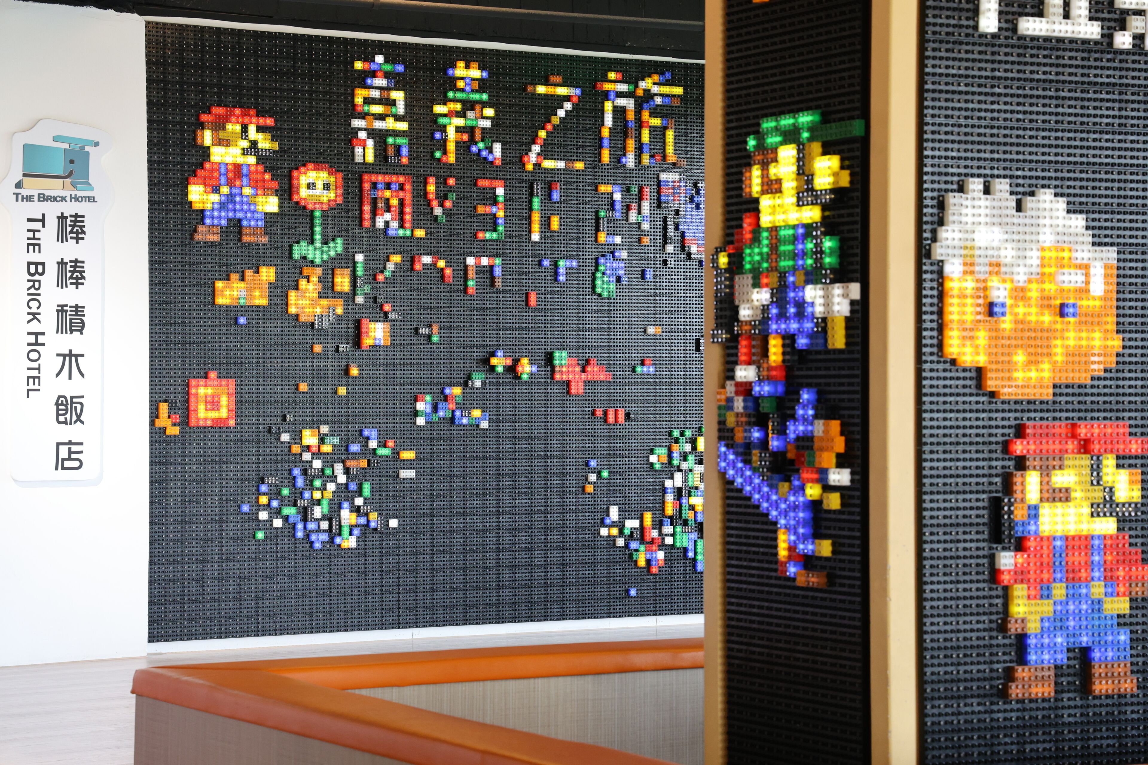 Una ilustración de arte pixelado con Mario y Luigi de la serie Super Mario.