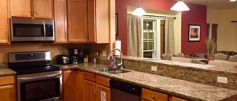 Coffee/tea maker, fridge, microwave, oven