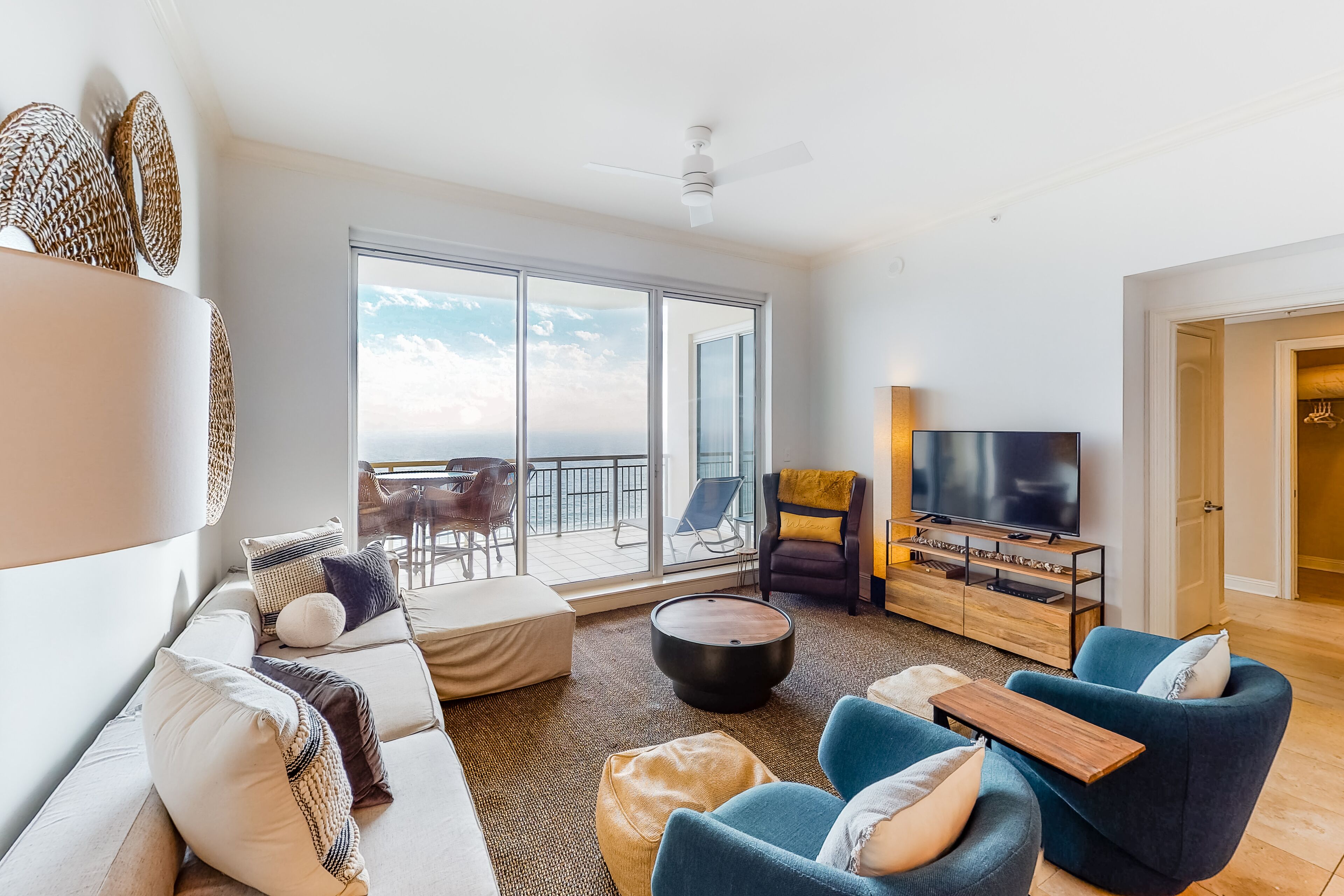 Updated oceanfront penthouse with sunset balcony views, pool, hot tub & gym