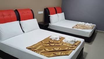 Quad Room | Desk, iron/ironing board (on request), WiFi (free), bed sheets