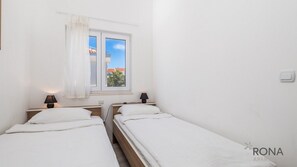 2 quartos, Wi-Fi de cortesia, roupa de cama