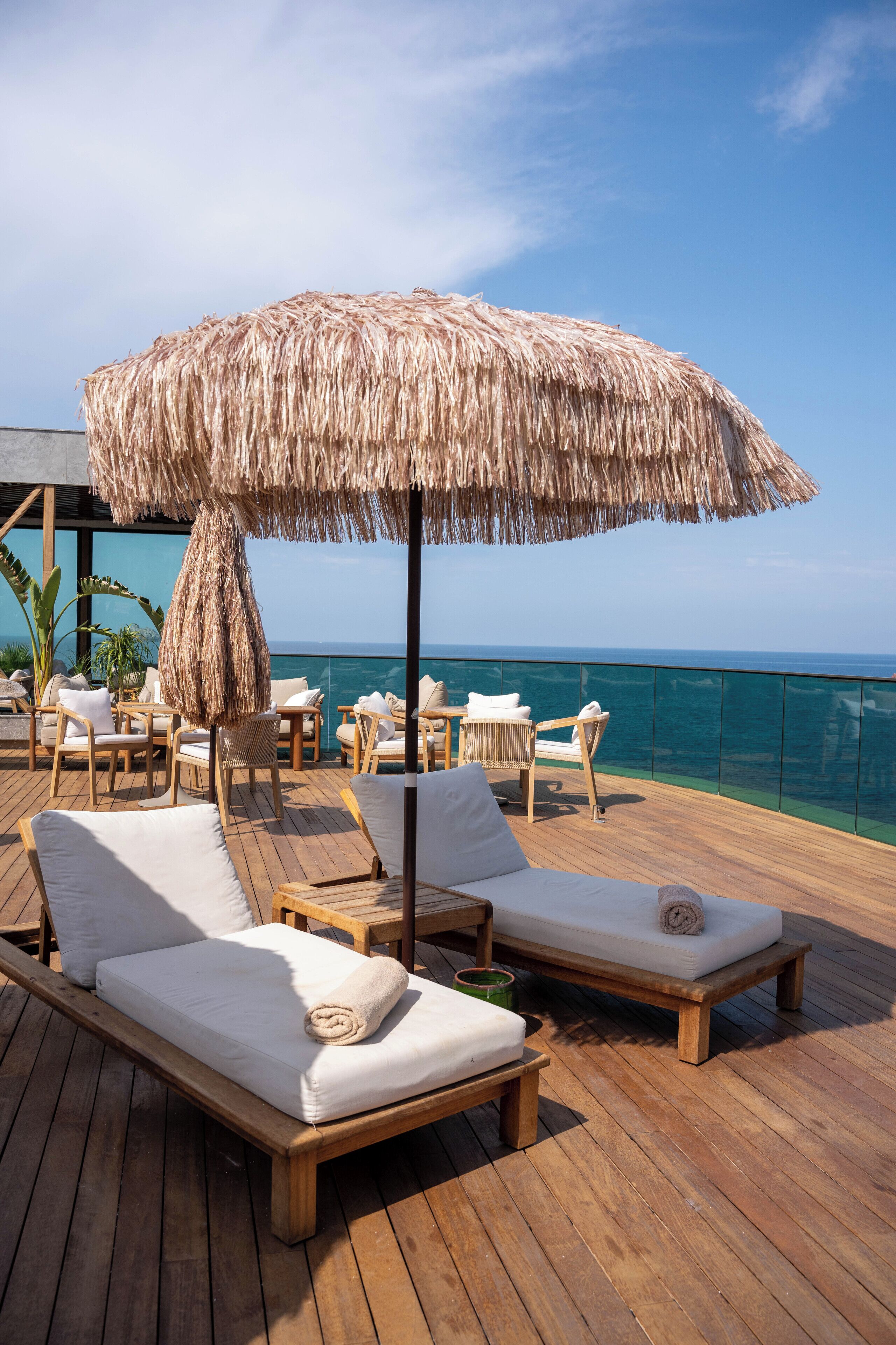 On the beach, free beach shuttle, free beach cabanas, beach umbrellas