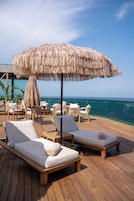 En la playa, traslado desde/hacia la playa gratis, camas de playa gratis