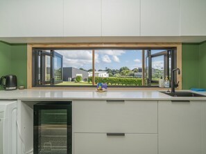 Fridge, toaster, highchair, cookware/dishes/utensils