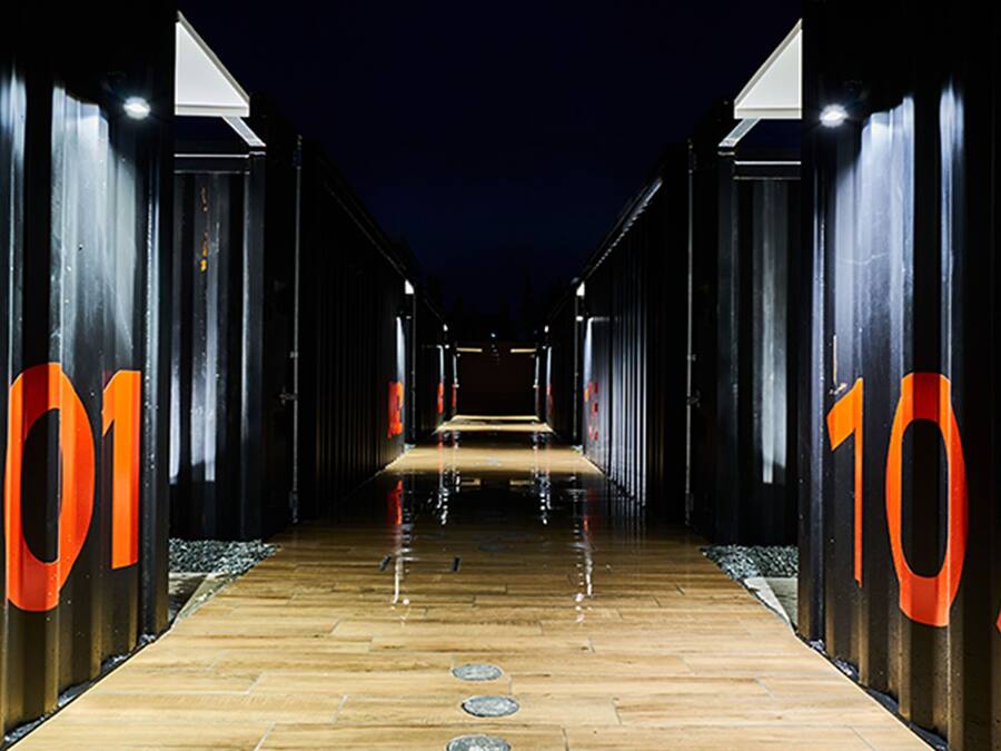 A corridor with numbers 101 and 105 on the walls, leading to a central area.