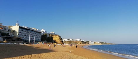 On the beach, sun loungers