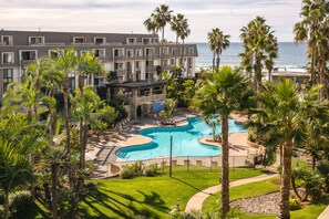 A heated pool - Resort-Style Beach Condo with Pools, Hot Tubs & a Tranquil Garden View (Oceanside)