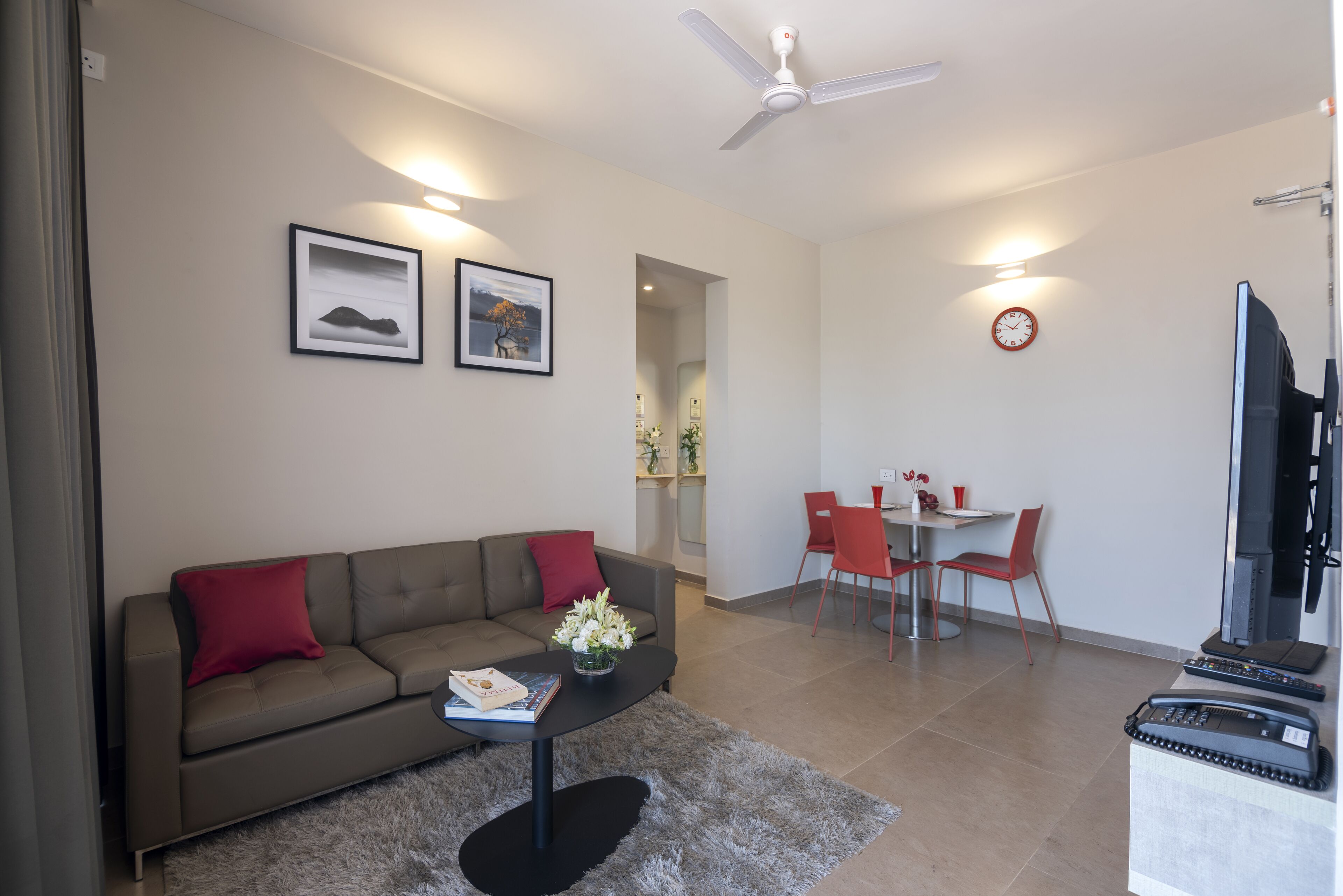 avora 02 bed room studio | living area | 43-inch led tv with digital channels, tv, fireplace