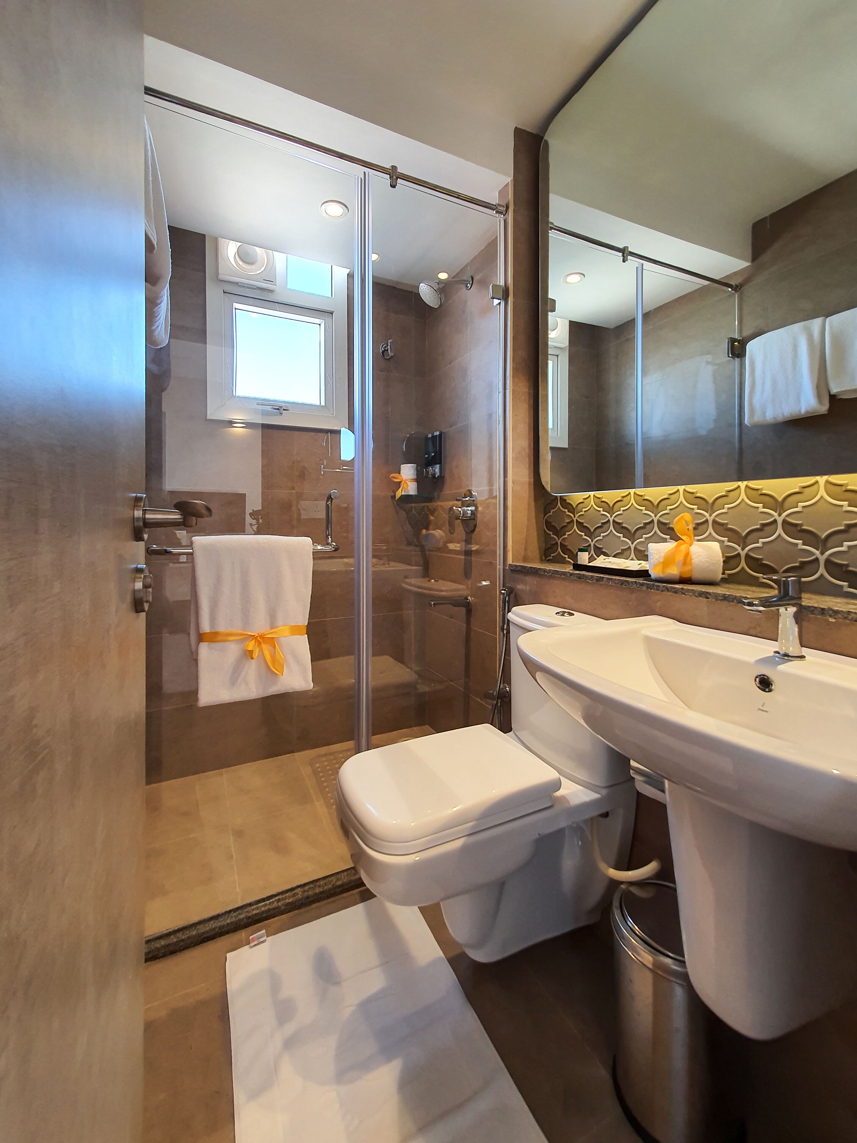 avora studio | bathroom | shower, designer toiletries, hair dryer, bathrobes