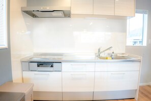 Fridge, microwave, stovetop, cookware/dishes/utensils