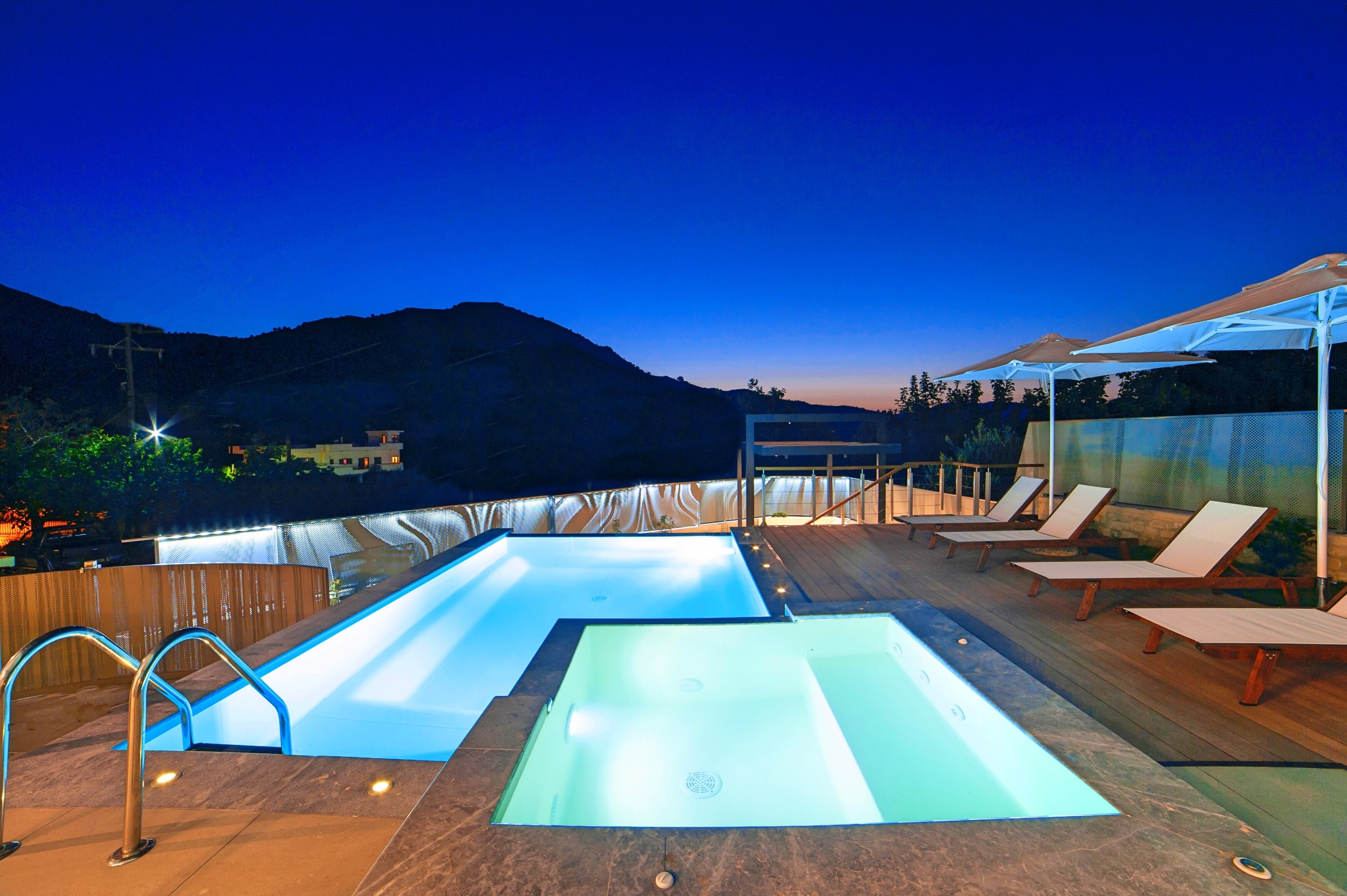 Outdoor pool, a heated pool, sun loungers