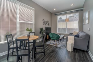 Classic Apartment, 1 King Bed with Sofa bed, Non Smoking (Self Check-in with Virtual Front Desk) | Living area | 49-inch Smart TV with digital channels, TV, streaming services - Kasa Downtown Des Moines (Des Moines)