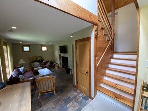 Smart TV, fireplace, DVD player, books