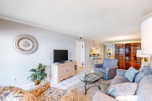 Flat-screen TV, DVD player, video library