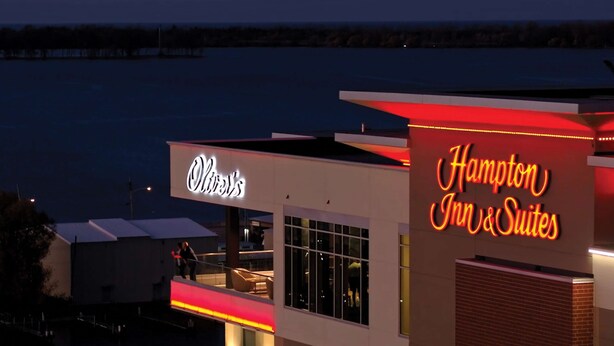 A hotel named 'Olive's' with a 'Hampton Inn & Suites' sign. - Hampton Inn & Suites Erie Bayfront (Erie)