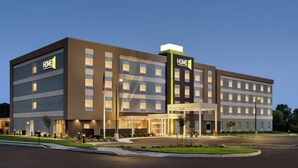 A multi-story hotel with a prominent "HOME2" sign, a well-lit entrance, and a parking lot. - Home2 Suites by Hilton Ephrata (Ephrata)