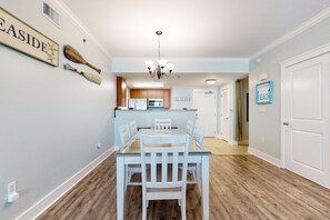 Enjoy meals in this inviting dining area with a central table and six chairs.